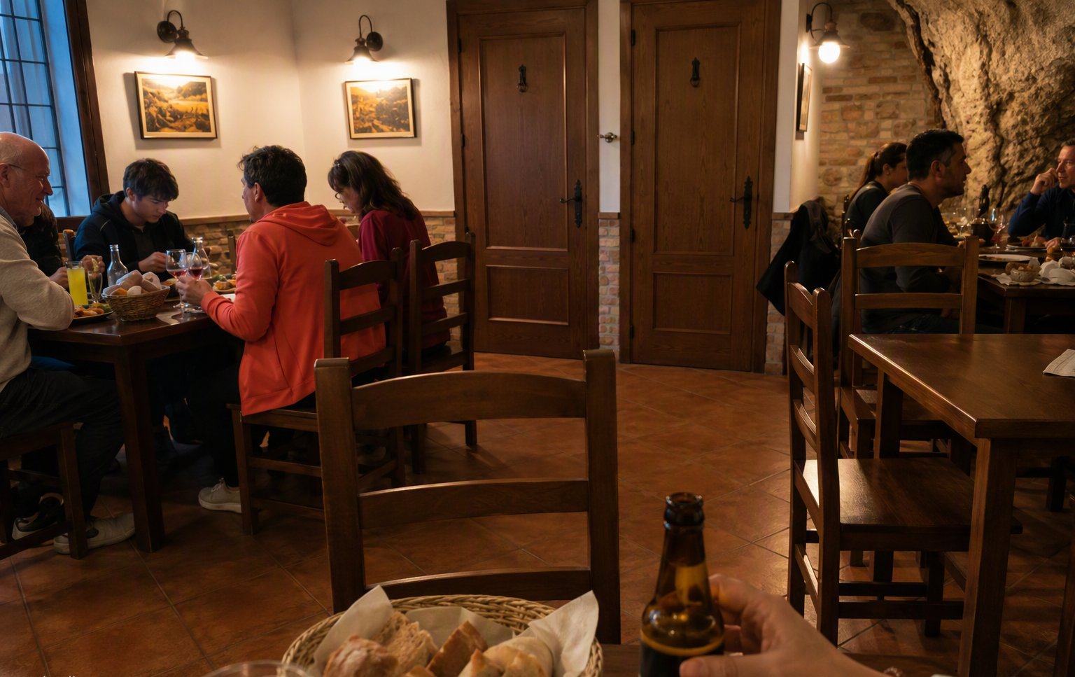 The upper dining room under the rock at La Tasca